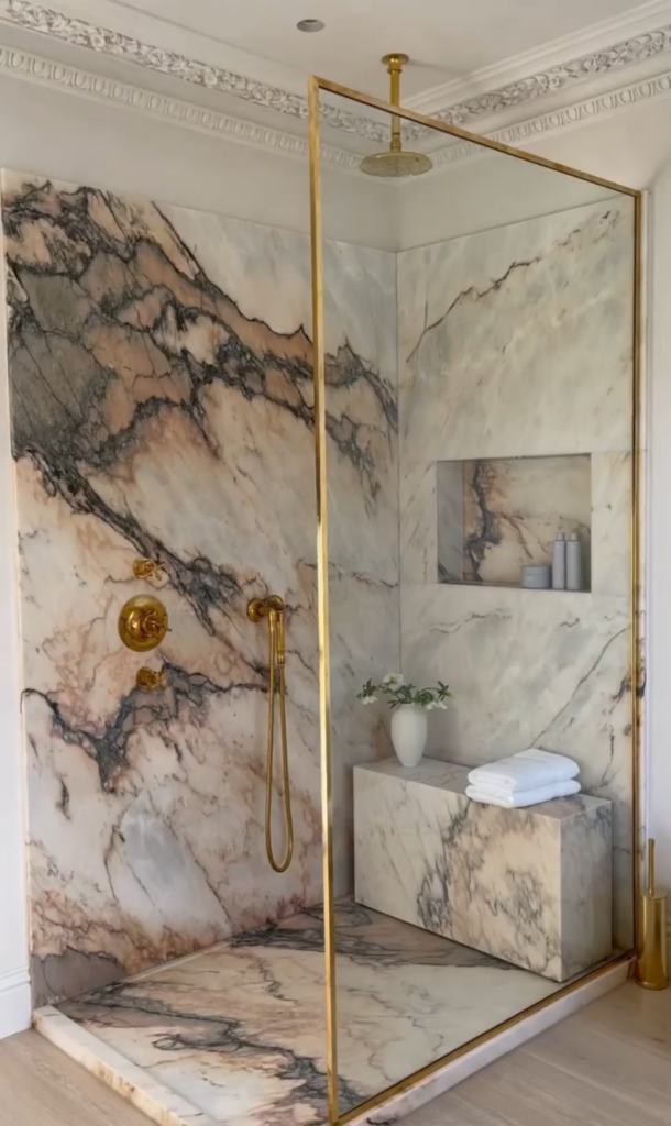 Marble walk-in shower of Sarah-Louise Phelps and Christopher Phelps founders of No.17 House